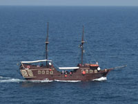 small old ship in wide sea