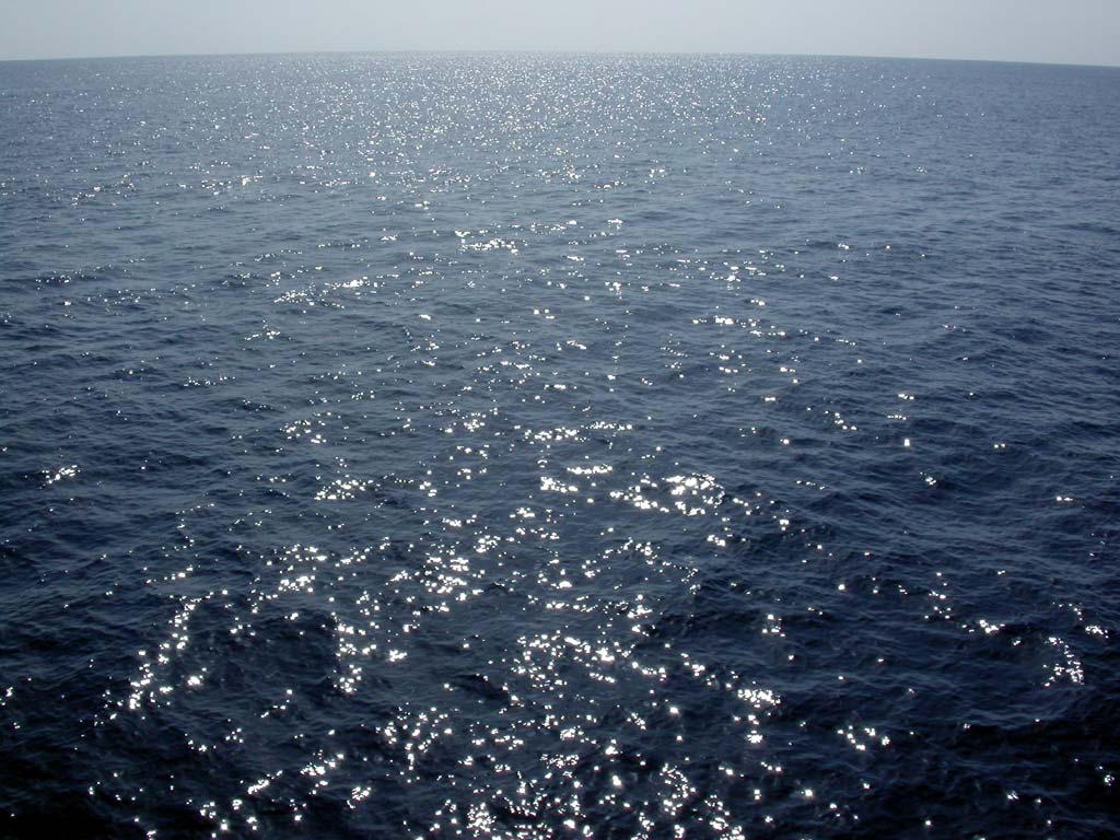 Dark blue wide sea up to horozon.